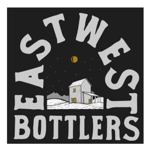 EastWest Bottlers logo