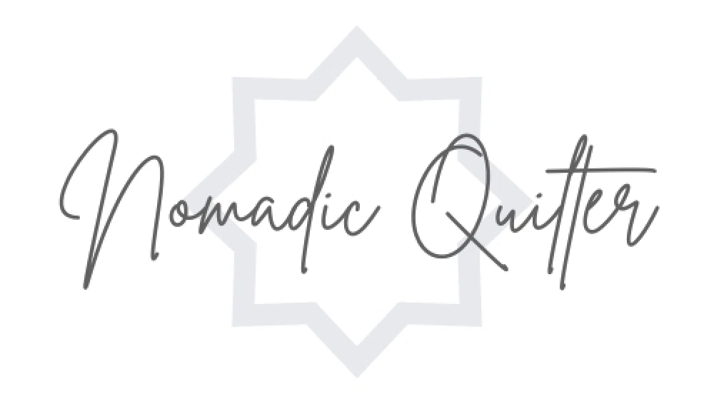 The Nomadic Quilter logo