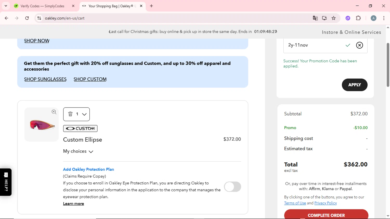 Oakley promo code screenshot showing code 2y-11nov applied at Oakley checkout page. Uploaded by SimplyCodes community member CrownSpotter6947 on Dec 23, 2025