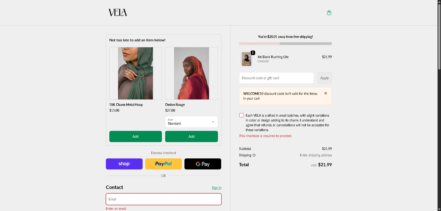 Vela Scarves checkout page showing Vela Scarves discount code box | Screenshot taken by SimplyCodes community member on Feb 24, 2026